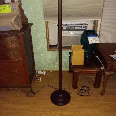Floor lamp with glass globe