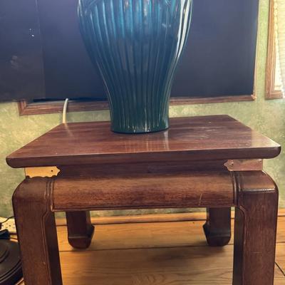 End table with vase