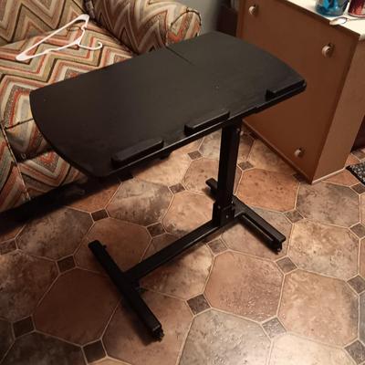 Chair with laptop table on casters