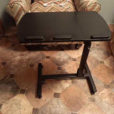 Chair with laptop table on casters