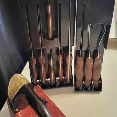 Vintage Cutco cutlery with holder and Cutco knife sharpener