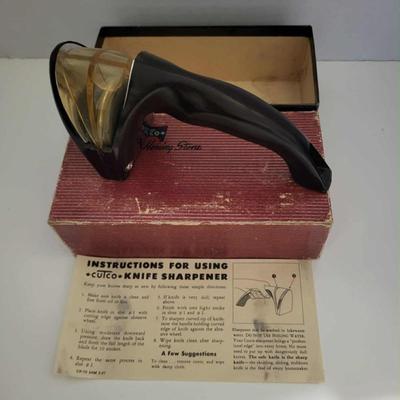 Vintage Cutco cutlery with holder and Cutco knife sharpener