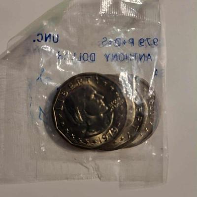 3 Eisenhower dollars