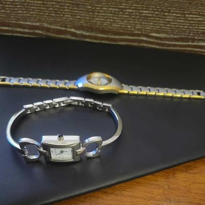 2 Gucci watches