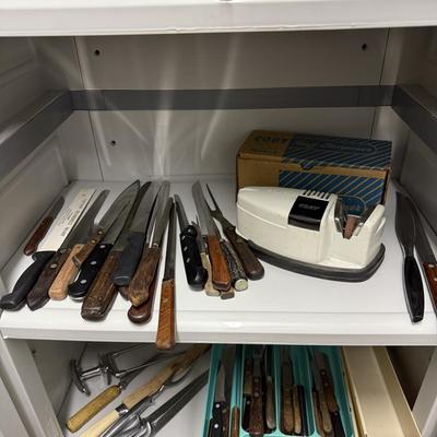 Sale Photo Thumbnail #1428: Comes with two shelves of vintage knives and vintage Cory knife sharpener
