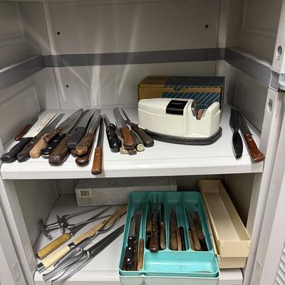 Sale Photo Thumbnail #1427: Comes with two shelves of vintage knives and vintage Cory knife sharpener