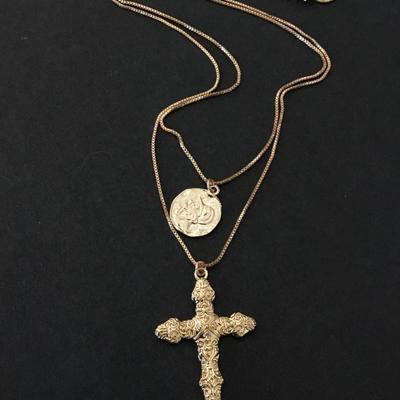 Beautiful cool toned, layered cross, and coin necklace
