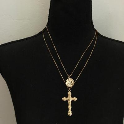 Beautiful cool toned, layered cross, and coin necklace
