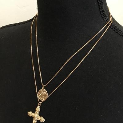 Beautiful cool toned, layered cross, and coin necklace