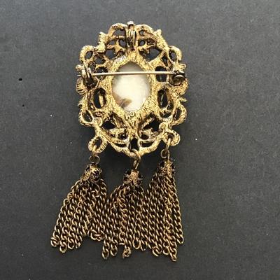 Vintage goldtone, porcelain cameo, tassel, brooch