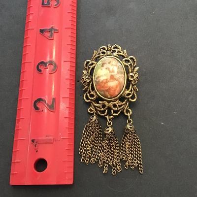 Vintage goldtone, porcelain cameo, tassel, brooch