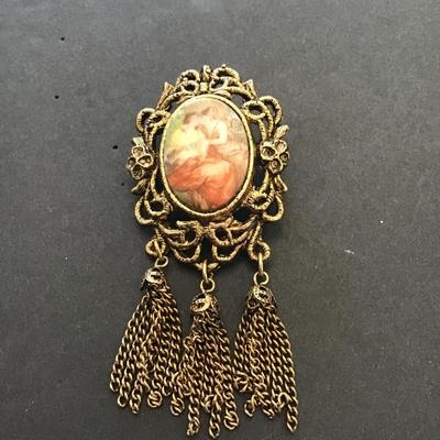 Vintage goldtone, porcelain cameo, tassel, brooch