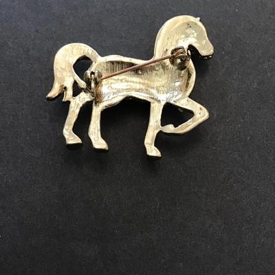 Vintage, gold tone, horse lapel pin with rhinestones