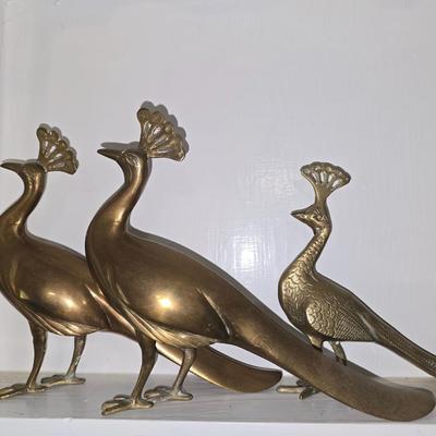 Brass peacocks