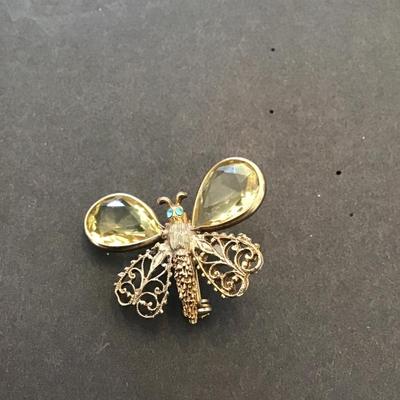 Vintage brushed gold tone, butterfly with champagne colored rhinestones
