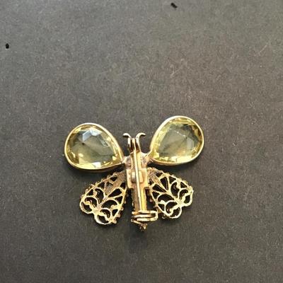 Vintage brushed gold tone, butterfly with champagne colored rhinestones