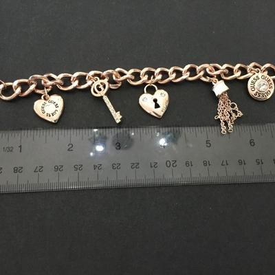 Cute rose, gold, toned, guess charm bracelet excellent condition