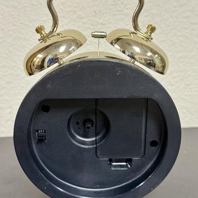 Sale Photo Thumbnail #390: Battery powered, runs and alarm rings as expected. Model LFD115G-M, made in Japan. Battery contacts corroded but clock functions. Nice display piece.
