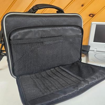 LOT 74P: Retro Road Trip!! Magellan GPS with Portable DVD Player, CD Player, and Accessories