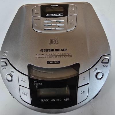 LOT 74P: Retro Road Trip!! Magellan GPS with Portable DVD Player, CD Player, and Accessories