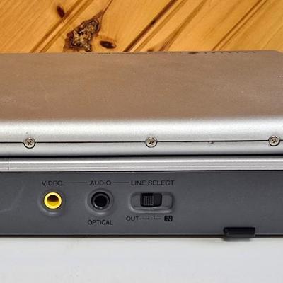 LOT 74P: Retro Road Trip!! Magellan GPS with Portable DVD Player, CD Player, and Accessories