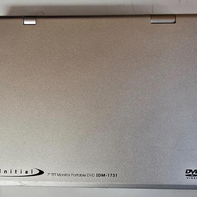 LOT 74P: Retro Road Trip!! Magellan GPS with Portable DVD Player, CD Player, and Accessories