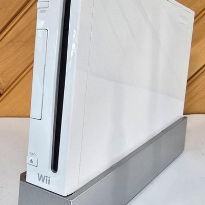 LOT 78F: GAME NIGHT! Nintendo Wii with 2 Controllers and 4 Game Disks