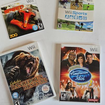 LOT 78F: GAME NIGHT! Nintendo Wii with 2 Controllers and 4 Game Disks