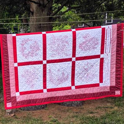 LOT 85L: Two Vibrant Vintage Quilts