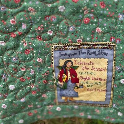 LOT 96L: Two Handmade Vintage Quilts