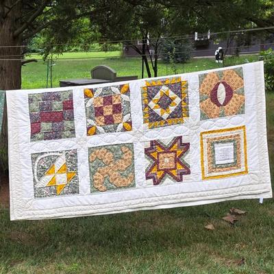 LOT 96L: Two Handmade Vintage Quilts