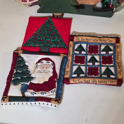 LOT 104S: Beautiful Christmas items, Includes Handmade Quilt Wall Hanging, Wooden Sled, Jar Of Jingle Bells & More