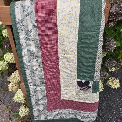 LOT 120S: Leaning Ladder W/Vintage Handmade Table Runner & Quilts