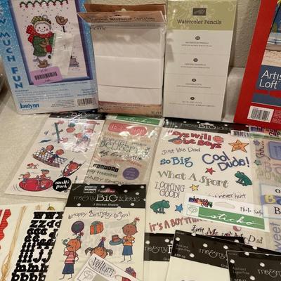 Stickers, watercolor, and ribbon