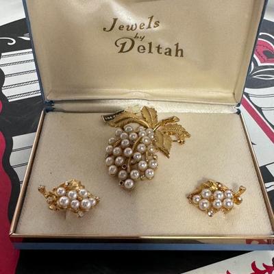 TRIFARI jewelry set features a Crown cluster brooch and matching clip earrings adorned with faux pearls
