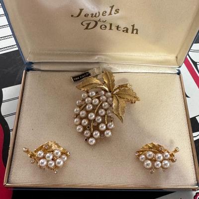 TRIFARI jewelry set features a Crown cluster brooch and matching clip earrings adorned with faux pearls