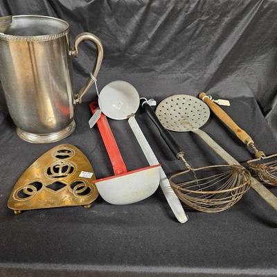 Lot of 7 Vintage & Rustic Kitchen Tools Including Stainless Steel Water Pitcher, Enamel and Handmade Trivet