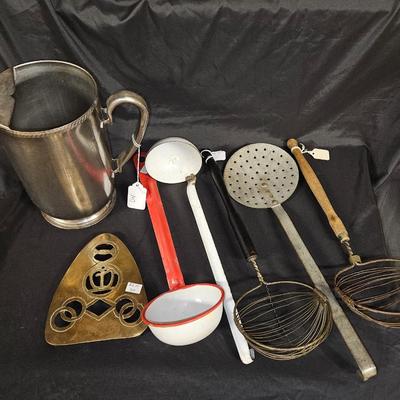 Lot of 7 Vintage & Rustic Kitchen Tools Including Stainless Steel Water Pitcher, Enamel and Handmade Trivet