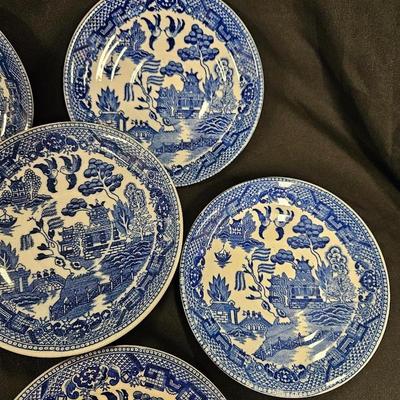 Lot of 12 Blue Willow Items Including 9 Saucers and 3 Sandwich Plates