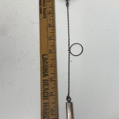 Sale Photo Thumbnail #13: Snap-open lid reveals a mirror inside the lid and a chamber for holding makeup powder. Attached rectangular tube likely held a pencil. Weight is 50.6g. Great condition, no dings or damage.