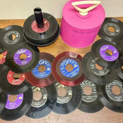 Sale Photo Thumbnail #23: The records are in fair to good condition, there might be signs of wear including scratches, but nothing too deep.  The previous owner has labeled the records with a number system. The case is easy to use, just cover, twist and carry.