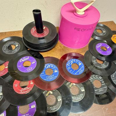 Sale Photo Thumbnail #21: The records are in fair to good condition, there might be signs of wear including scratches, but nothing too deep.  The previous owner has labeled the records with a number system. The case is easy to use, just cover, twist and carry.