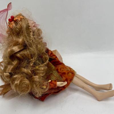 Sale Photo Thumbnail #149: In good condition. Her hair could use some combing.