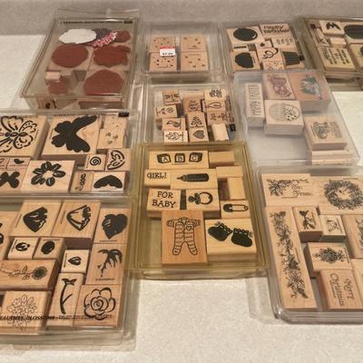 Wood stamps in plastic containers