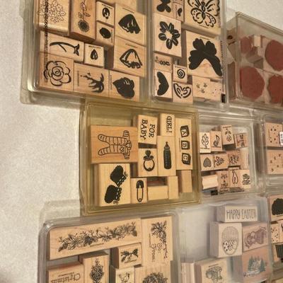 Wood stamps in plastic containers