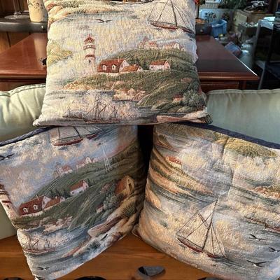 5 pillows - 3 are seashore scenes