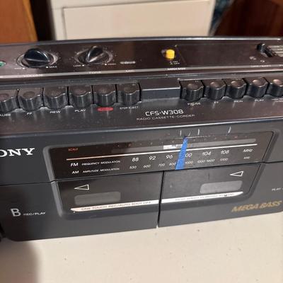 3 boomboxes & telephones