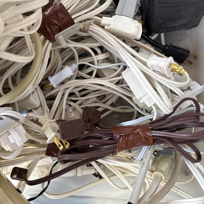 Tote full of extension cords & power strips