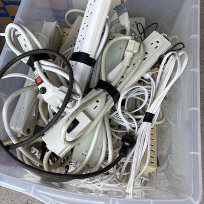 Tote full of extension cords & power strips