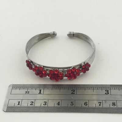 Silver tone red flower cuff bracelet